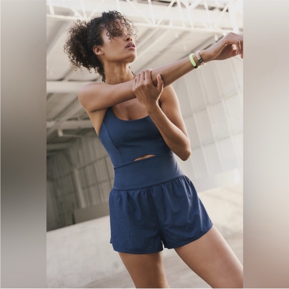 NWT Free People Movement Righteous Runsie in SuperNova M
